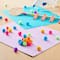 24 Packs: 65 ct. (1,560 total) Bright Multicolor Pom Poms by Creatology™